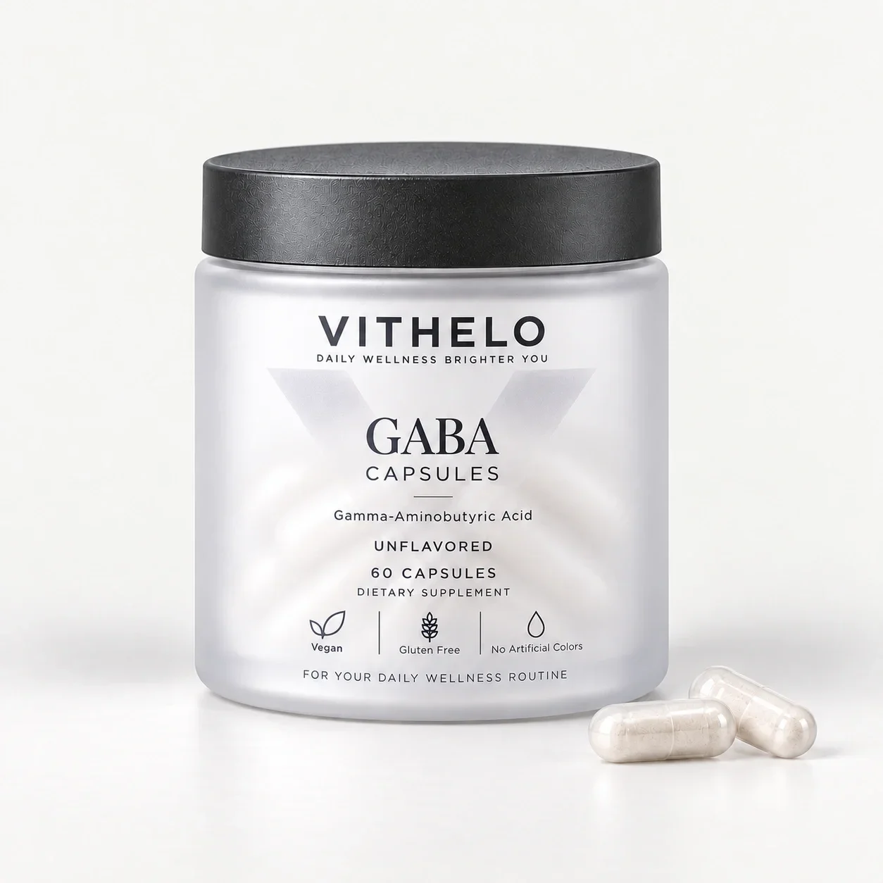 VITHELO GABA Capsules cold-mist-white frosted bottle with graphite cap and two transparent hard capsules.